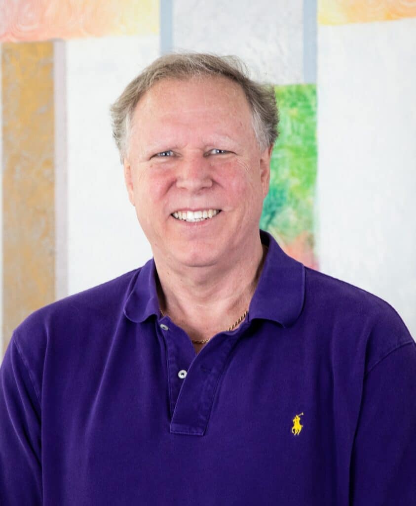 Dr. Rusty Barrier in a purple shirt